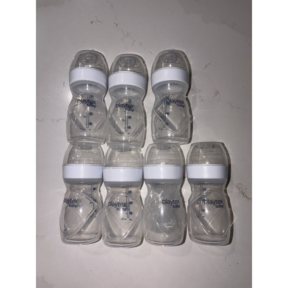 7 Playtex Nurser Drop In Bottles W/ Lids, 4oz
